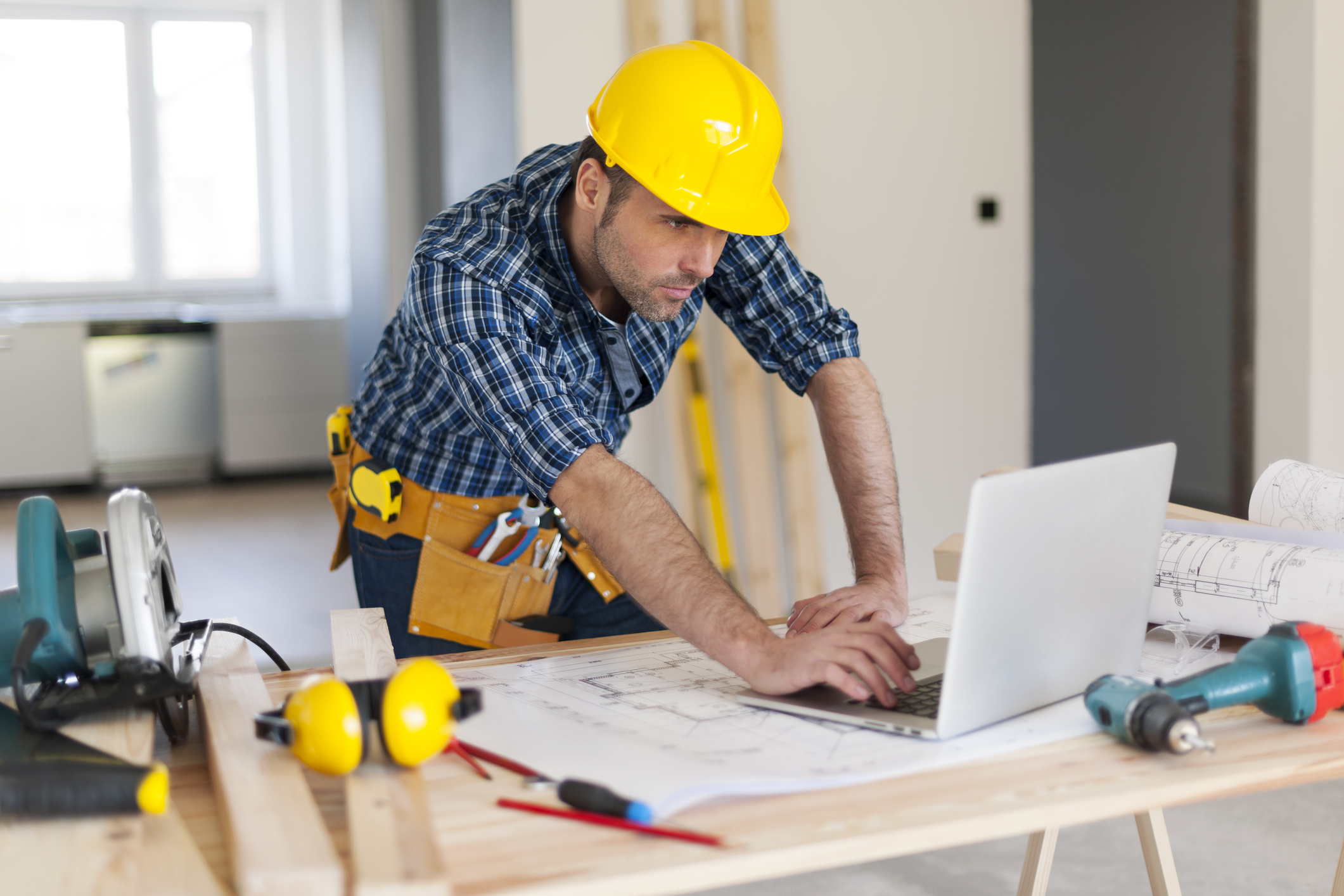 Portrait of hard working building contractor